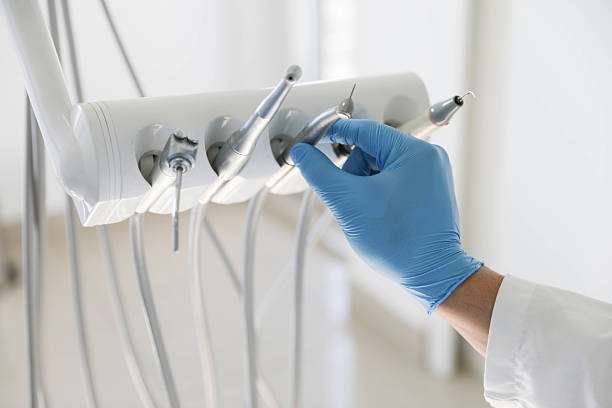Professional Tooth Extraction technician working in Anderson, IN